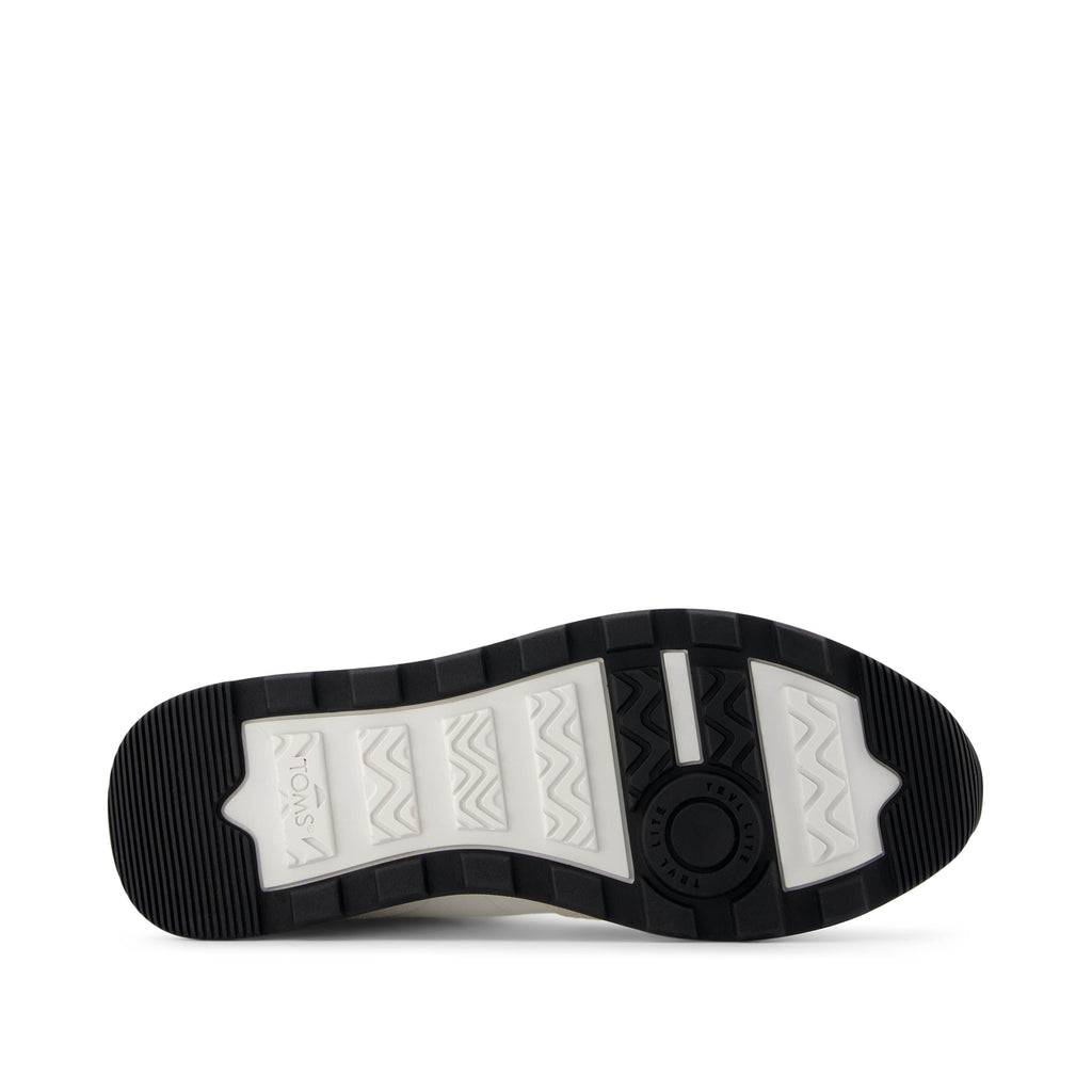 TRVL Lite Retro Runner White Suede Water Repellent Sneaker Bottom Sole View
