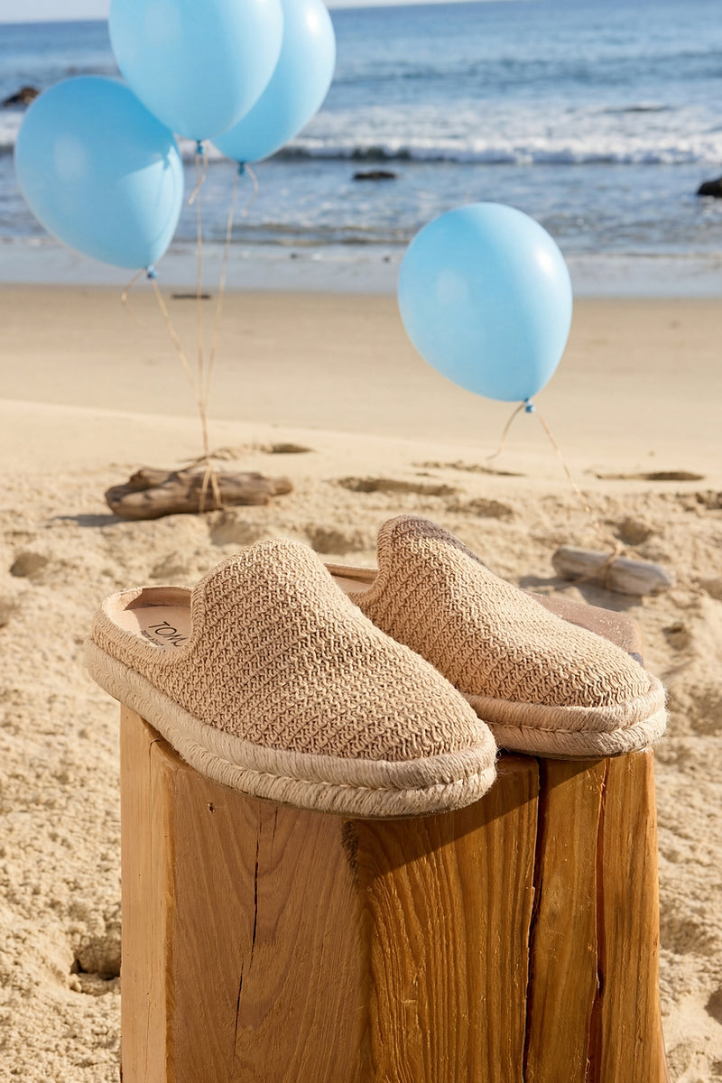 Santiago Mule in Light Caramel Brown Mesh on a wood