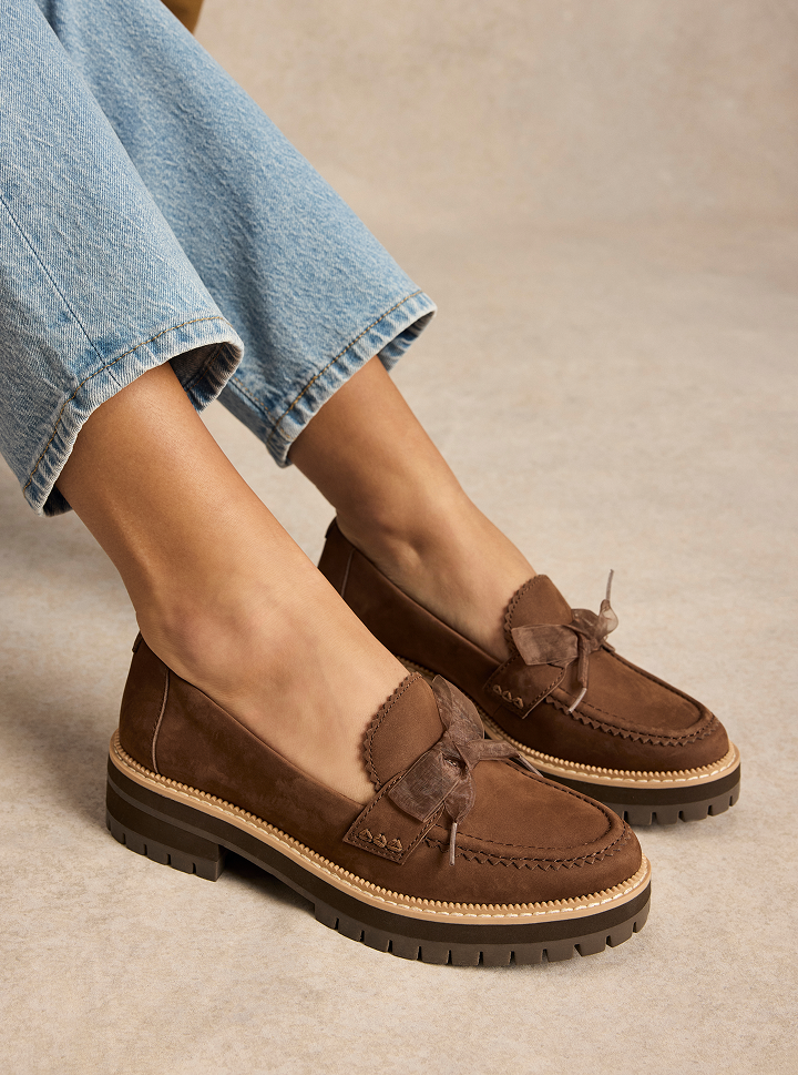 Cara Bow in Hot Cocoa Brown Leather on foot