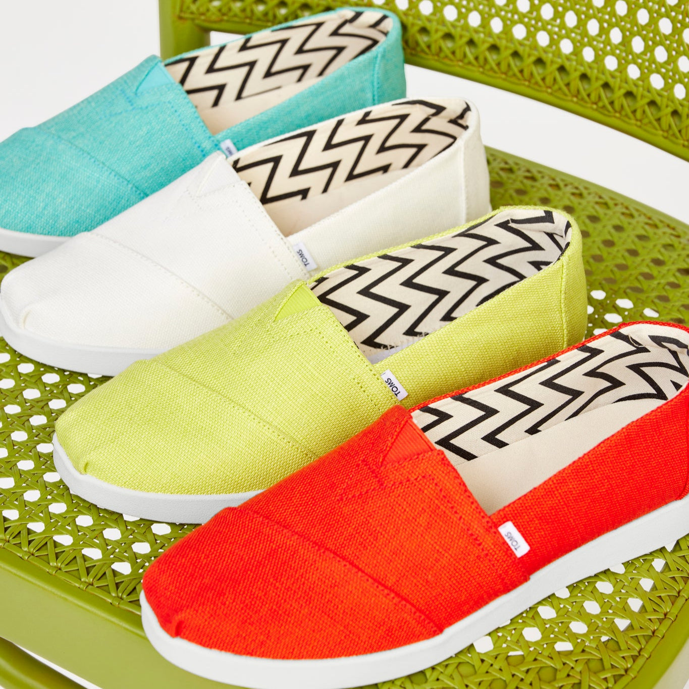 Laydown image of the bright lime heritage canvas Alpargata Plus